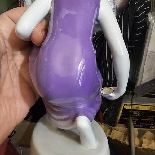 Hollohaza porcelain figurine of girl collecting water used