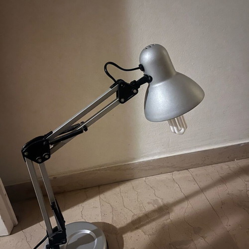 Adjustable desk lamp used
