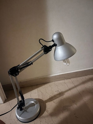Adjustable desk lamp used