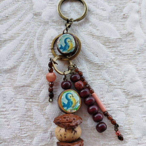 Purse charm keychain new, handmade with wood beads and almond shells