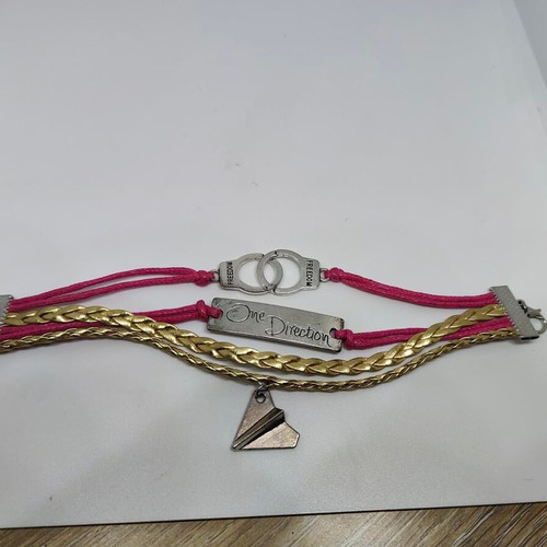 One Direction collectible bracelet like new with metal details