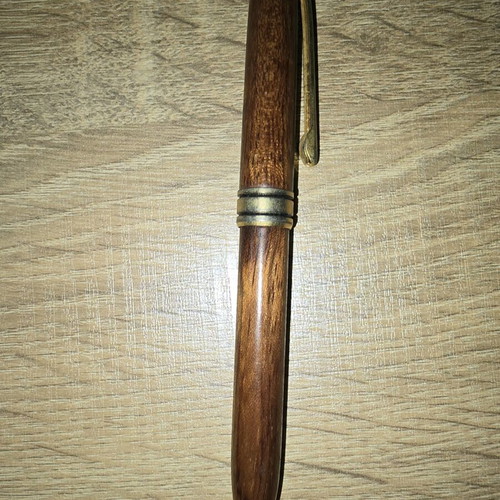 Wooden pen used with blue ink