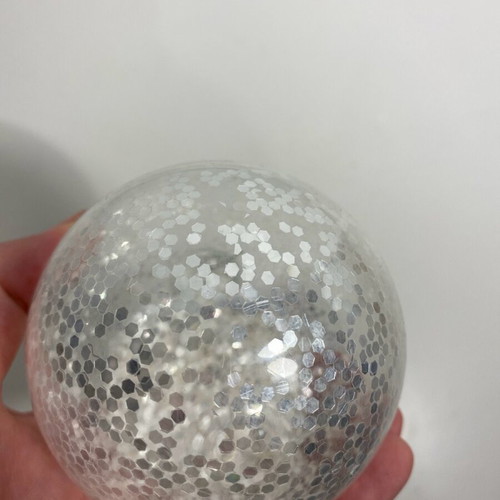 Christmas ball with silver glitter like new, transparent