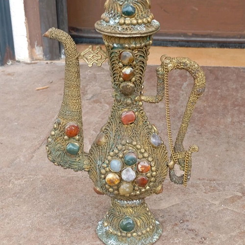 Antique ritual pot with real stones used