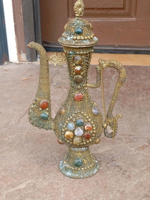 Antique ritual pot with real stones used