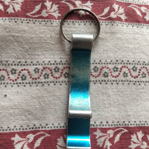 Keychain bottle opener used, white and blue