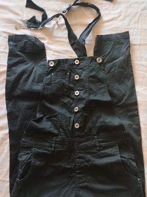 Black salopette used, slim fit, with buttons and clips