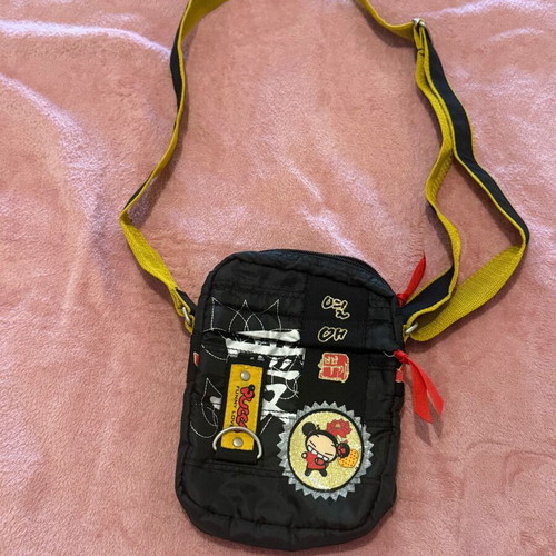 Mini crossbody bag Pucca Funny Love black like new