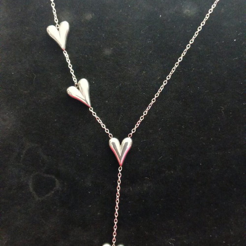 Necklace new stainless steel with asymmetrical silver hearts