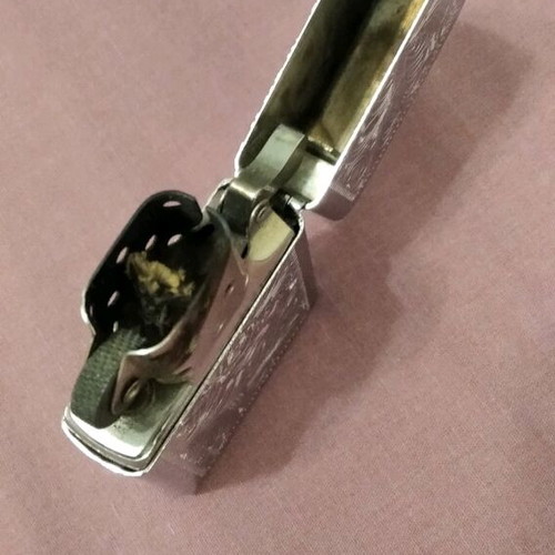 Zippo lighter collectible like new, silver with engravings