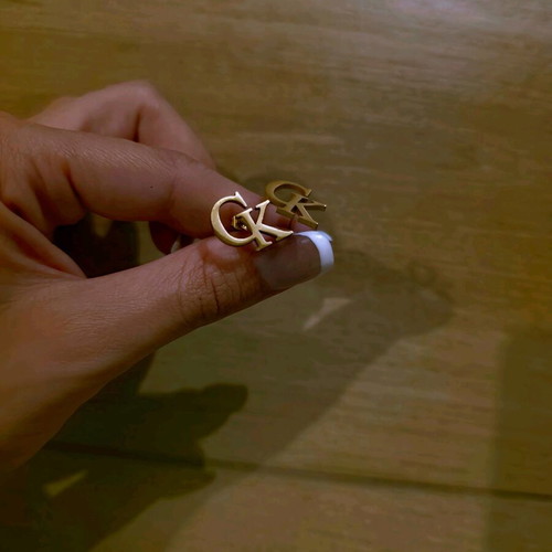 CK earrings gold plated new