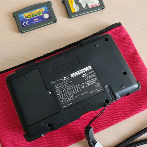 Nintendo DS (2004) console used with 2 games, charger, and accessories