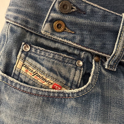 Diesel denim shorts vintage with rips, size 36