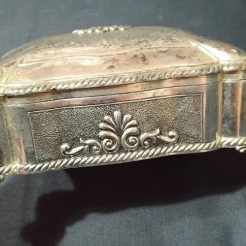 Vintage silver-plated jewelry box with floral design