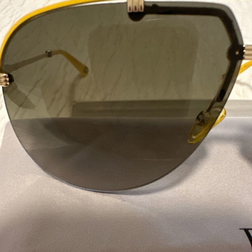 Dior women's sunglasses used with yellow frame
