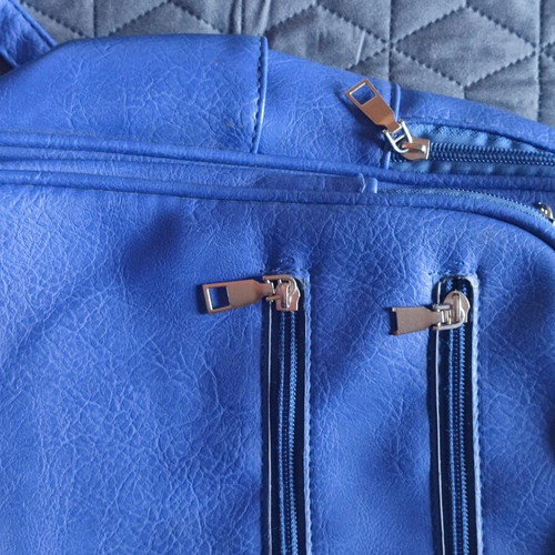 Blue women's backpack like new, PU leather with embossed texture