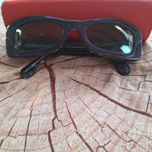 John Galliano sunglasses used, distinctive purple