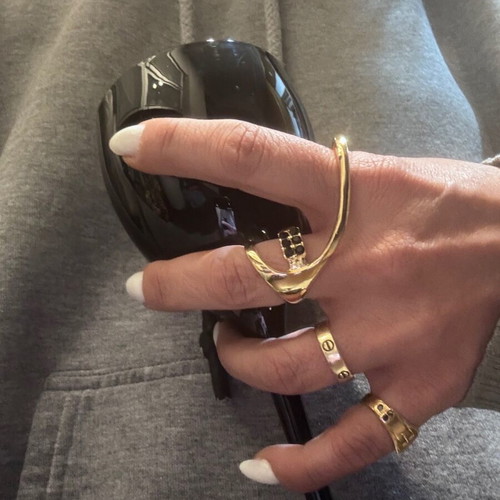 Serpenti style ring in gold stainless steel like new with black zircon stones