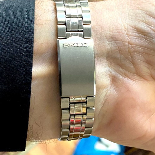 Seiko 5 DX men's watch new, steel, with briolette sapphire