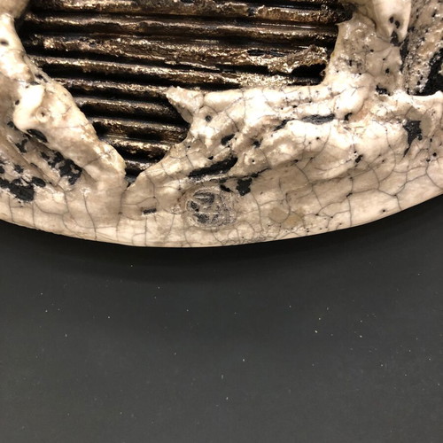 Wall ceramic sculpture used, moon on black wooden panel