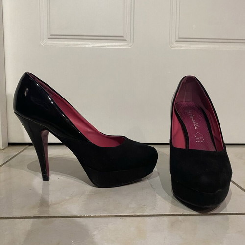 Black pumps used, half glossy - half suede style, size 39