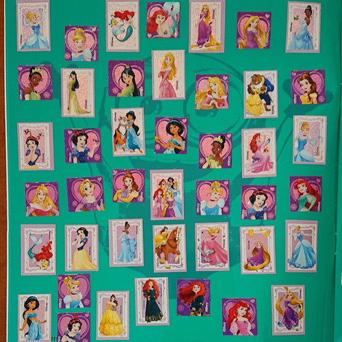 Minions sticker album used, half completed by GIM S.A.
