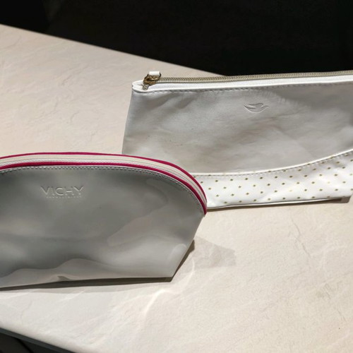 Vichy and Dove toiletry bags new, white, spacious
