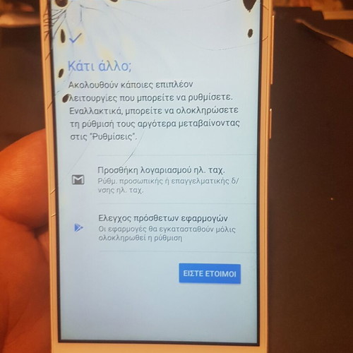 Xiaomi Redmi 4X smartphone with cracked screen, gold