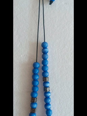 Worry beads like new with blue resin beads and metal separators