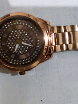Wristwatch rose gold used with bracelet and rhinestones