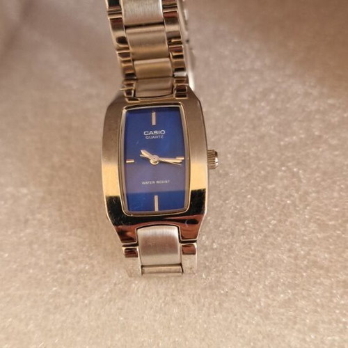Casio Quartz wristwatch women's used with blue dial and silver bracelet