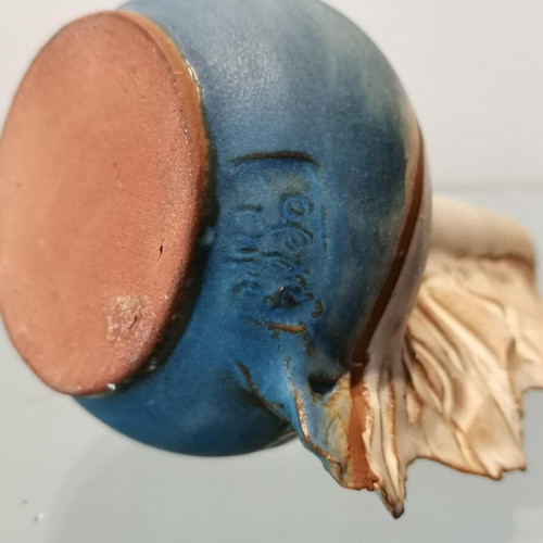 Handmade clay vase used with wavy finish