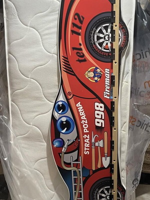 Children's car bed like new with 2 mattresses large and small