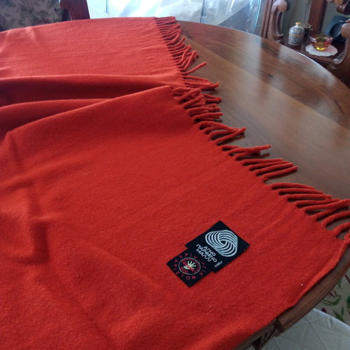 Wool blanket like new, solid brick red color