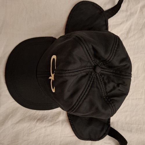 Jockey hat like new with ear protection, adjustable size, black and red