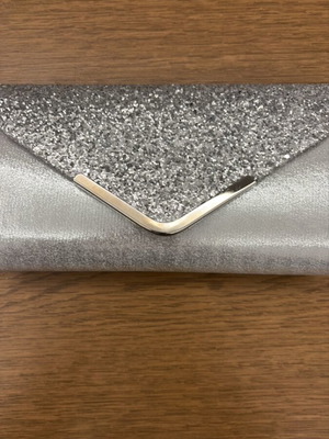 Silver evening clutch bag like new with glitter and chain