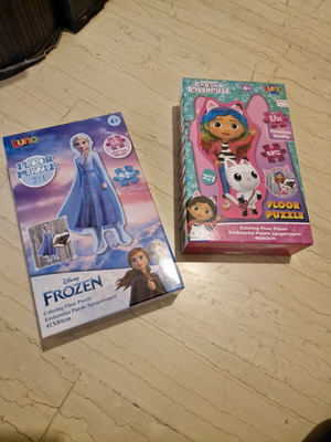 Frozen and Gabby's Dollhouse puzzles used, 52 pieces each