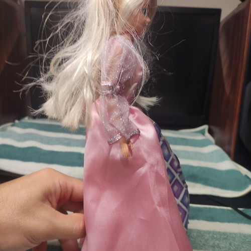 Doll with beautiful dress used