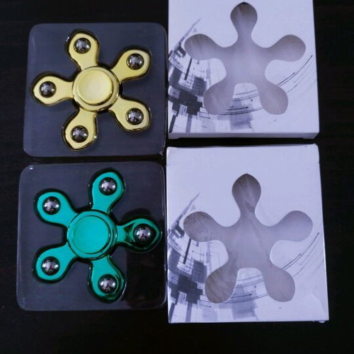 Fidget spinner pack of two like new with rust on iron