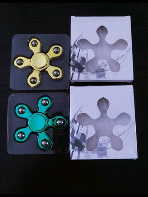 Fidget spinner pack of two like new with rust on iron