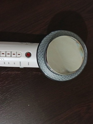 Massage device like new with electromagnetic pulses and phototherapy