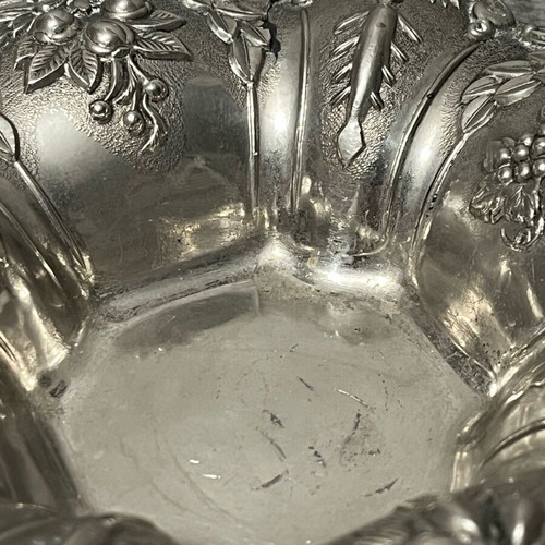 Decorative metal bowl used with embossed design