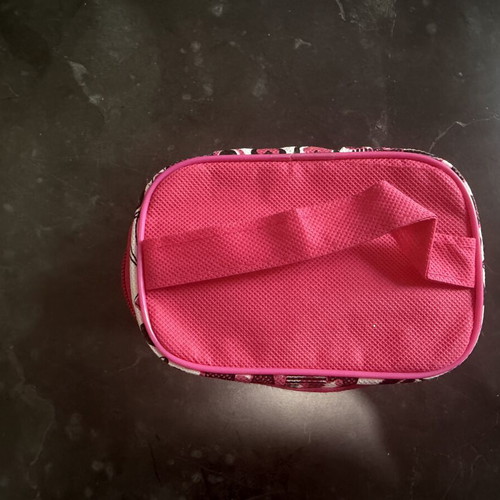 Small toiletry bag used, black and pink