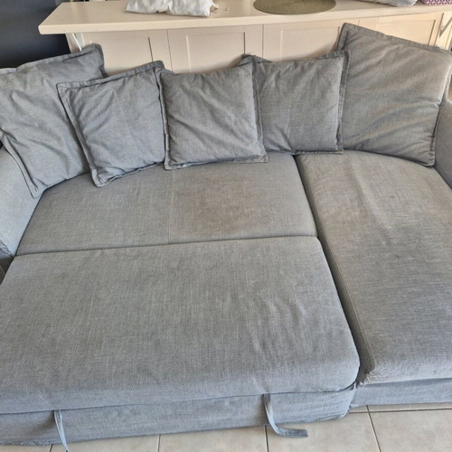 IKEA HOLMSUND corner sofa bed used with storage and washable covers