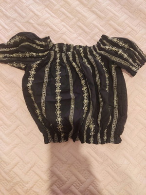 Black blouse new with gold details and elastic finish