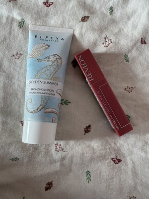 Elfeya Golden Summer bronzing lotion and Revlon lipstick