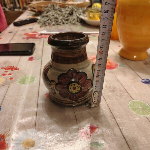 Antique vase with decoration restored