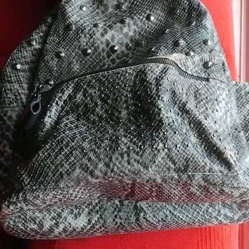 Snakeprint backpack used, grey with snake pattern and studs