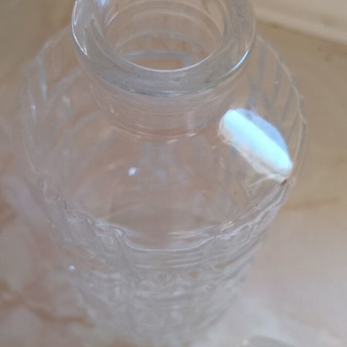 Glass decanter with stopper used, beveled design