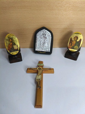 Decorative religious icons and cross like new